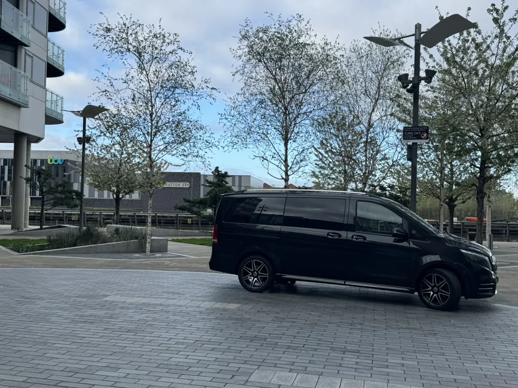 Black Mercedes-Benz V-Class chauffeur car at MediaCityUK in Salford