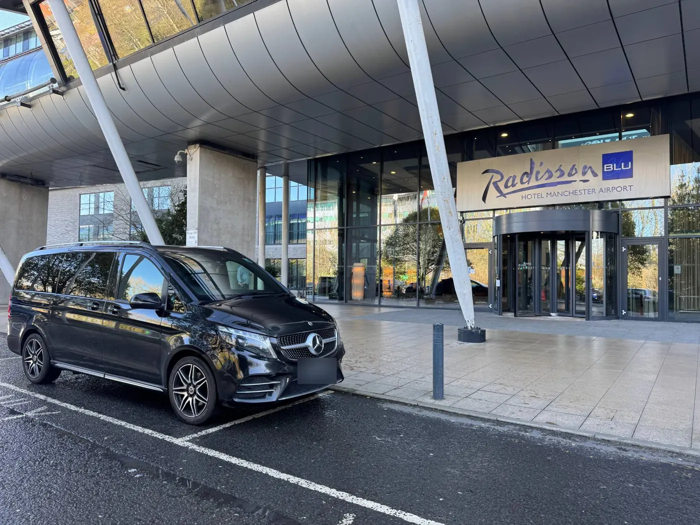 Mercedes V-Class chauffeur car outside the Radisson Blu hotel at Manchester Airport